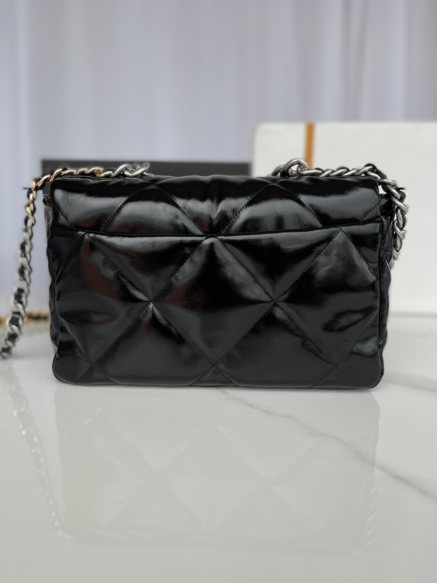 Ch**el 19 LARGE HANDBAG Shiny Leather, Gold-Tone, Silver-Tone & Ruthenium-Finish Metal Black 7.8 × 11.7 × 3.9 in
